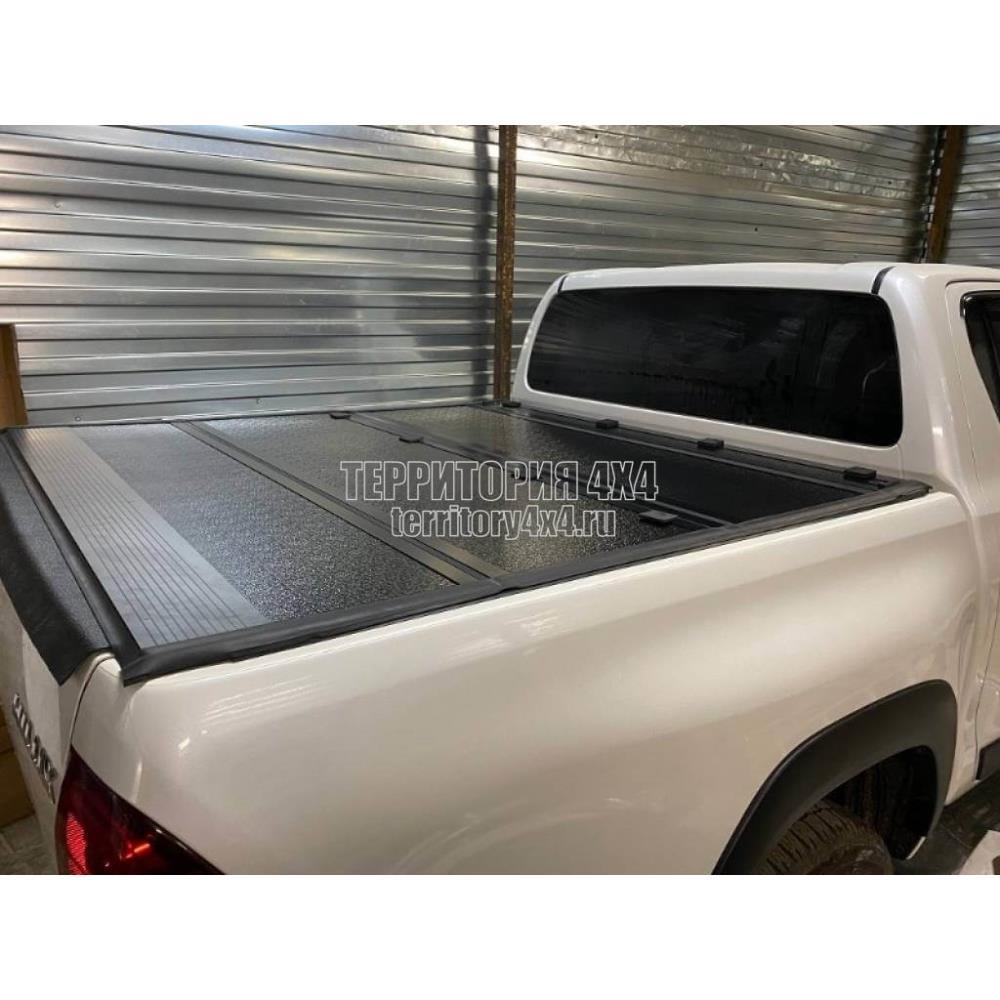 Крышка алюминиевая четырехсекционная Winbo на Toyota Hilux Revo (2015-2021)
