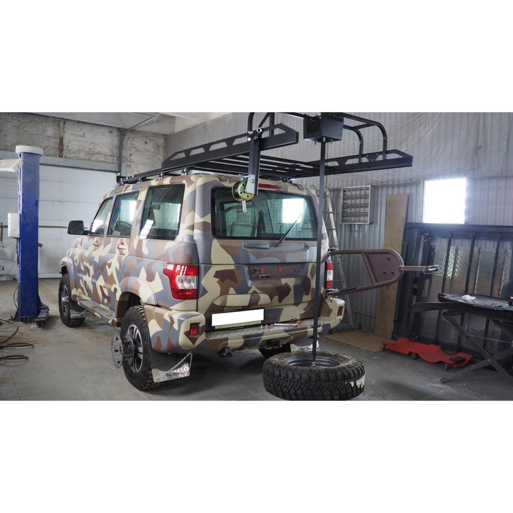 Багажник экспедиционный АВС-Дизайн на крышу UAZ Патриот с 2005- (без рейлингов) с креплением запасного колеса и с подъемным механизмом