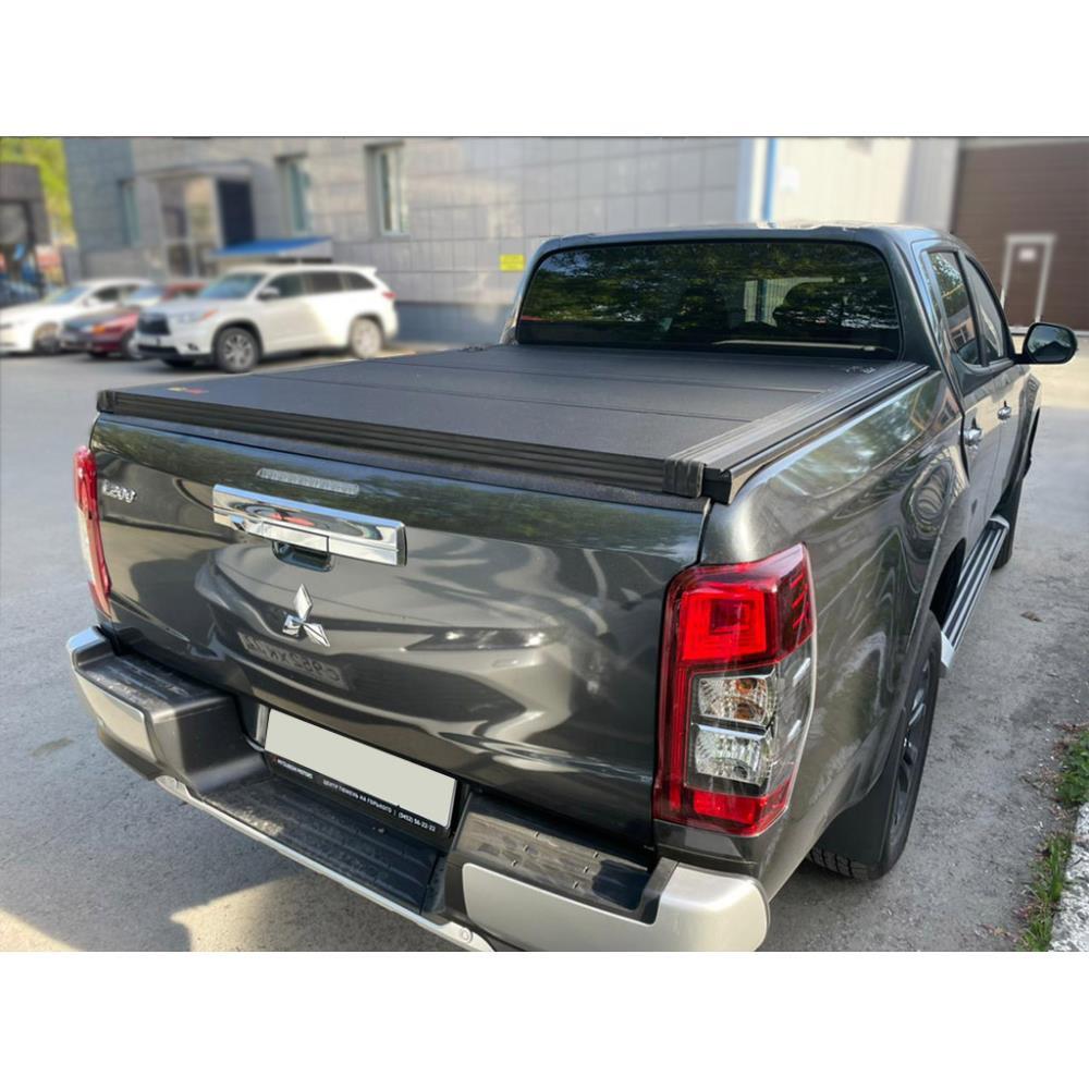 Четырех секционная крышка HAL PRO на Mitsubishi L200 2015