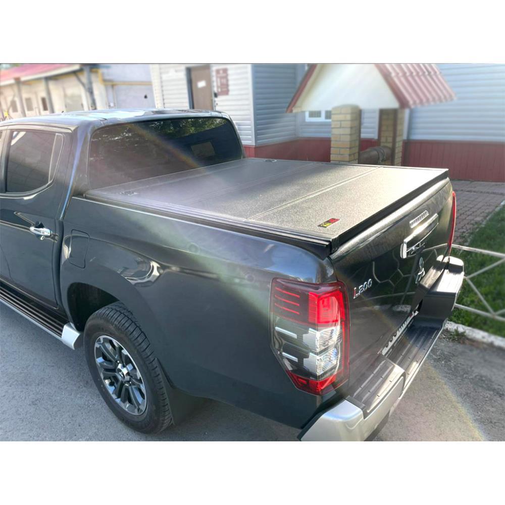 Четырех секционная крышка HAL PRO на Mitsubishi L200 2015
